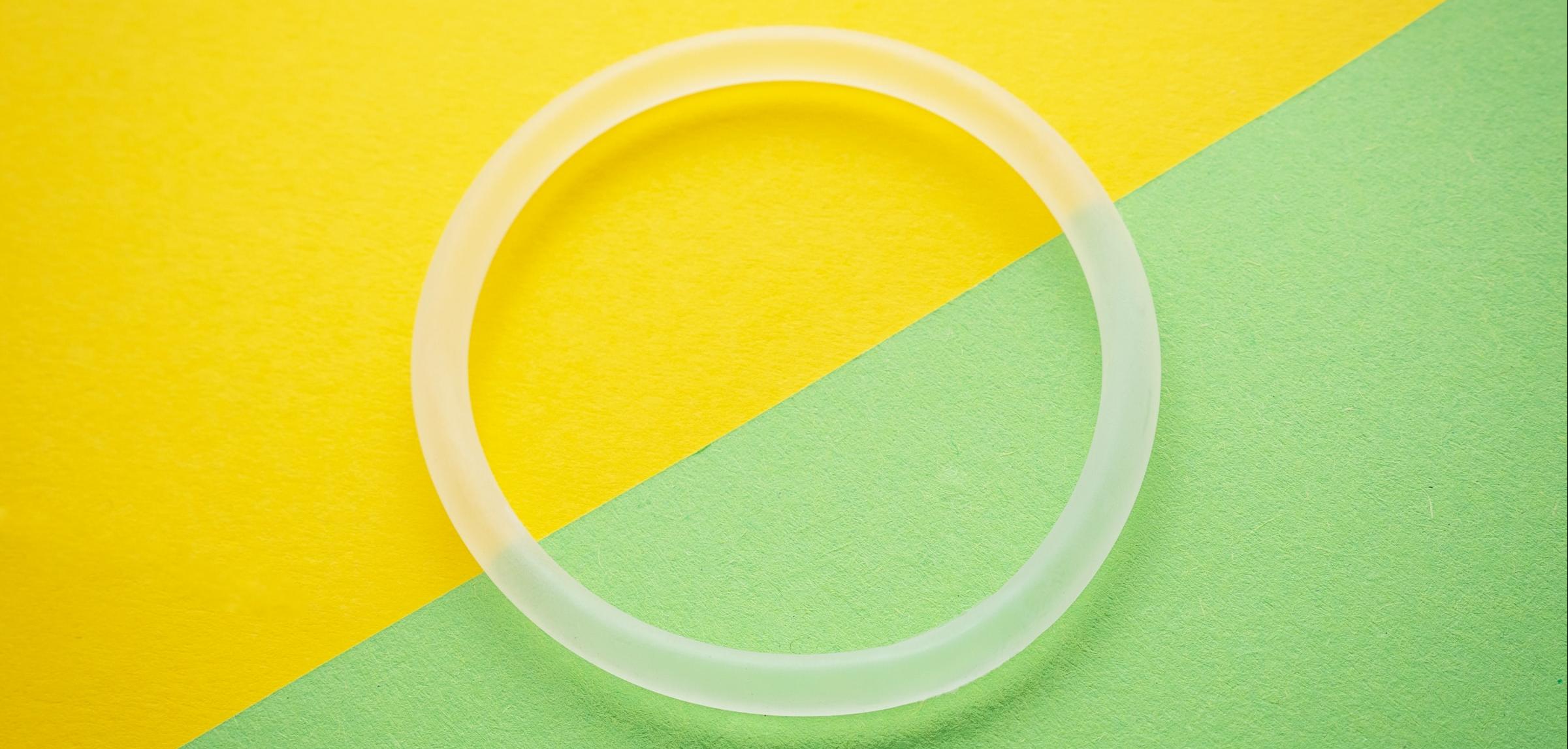 the ring birth control on a yellow and green background
