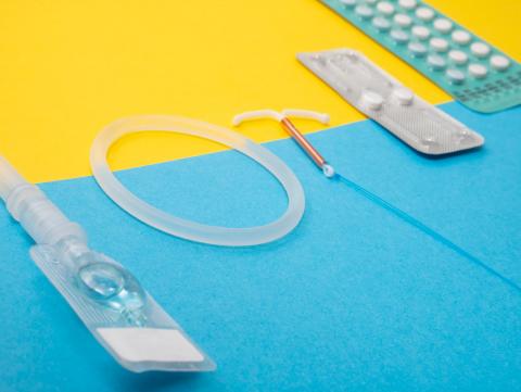 various methods of birth control displayed on a yellow and blue background